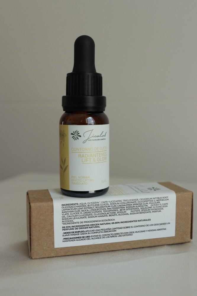 Contorno de ojos RadiantEyes Lift & Glow de JICALAB sobre su caja de cartón kraft